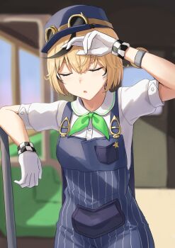  1girl ascot black_streaks blonde_hair blue_hat blue_overalls blurry blurry_background closed_eyes commentary dooby dooby_(1st_costume) gloves goggles goggles_on_headwear green_ascot hat highres indie_virtual_youtuber indoors overalls shirt short_hair solo train_conductor vakuuberi virtual_youtuber white_gloves white_shirt 