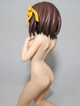  1girl absurdres ass back backboob bare_shoulders breasts brown_hair doll figure headband highres nude nude_filter photo_(medium) short_hair sideboob suzumiya_haruhi suzumiya_haruhi_no_yuuutsu third-party_edit  rating:Questionable score:63 user:Kyuubi840