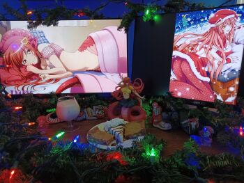  1girl 2d_dating ass asus badge big_boss breasts brownie_(food) cake christmas christmas_lights christmas_tree cosplay cup drinking_glass figure food hat highres in_shoe lamia large_breasts lying metal_gear_(series) metal_gear_solid_3:_snake_eater miia_(monster_musume) milk monitor monster_girl monster_musume_no_iru_nichijou naked_snake naked_snake_(cosplay) on_bed photo_(medium) plate santa_costume santa_hat wine_glass 