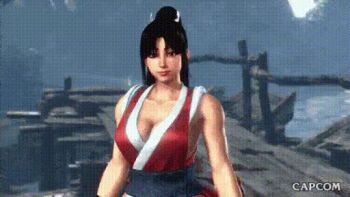  1girl animated animated_gif bare_shoulders breasts capcom cleavage collarbone fatal_fury female_focus game_screenshot hand_fan high_ponytail holding holding_fan japanese_clothes large_breasts long_hair ponytail shiranui_mai snk solo street_fighter street_fighter_6 video_game_screencap 