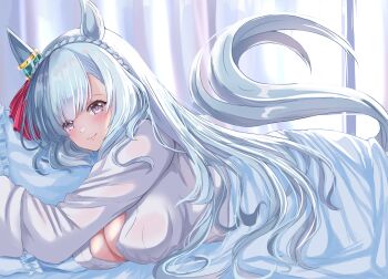  1girl absurdres animal_ears blue_hair blush bow braid breasts cleavage closed_mouth commentary_request crown_braid ear_ornament ear_ribbon highres horse_ears horse_girl horse_tail hugging_object kentan_(kingtaiki) large_breasts long_hair long_sleeves looking_at_viewer lying mejiro_ardan_(umamusume) on_stomach pillow pillow_hug purple_eyes shirt smile solo tail umamusume under_covers white_shirt 