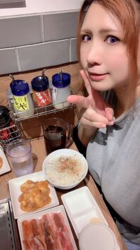  1girl asian brown_hair chouzuki_maryou lipstick makeup photo_(medium) plump solo  rating:General score:1 user:resident88