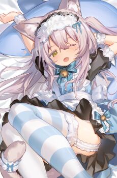  1girl animal_ear_fluff animal_ears apron bell cat_ears cat_girl cat_tail cloneko_(zelmeledf2) commentary_request dress garter_straps highres long_hair maid one_eye_closed original solo striped_clothes striped_thighhighs tail tail_ornament thighhighs 