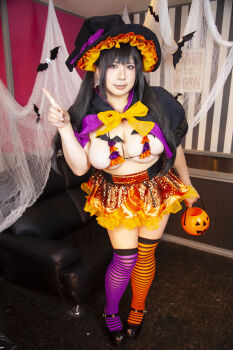  1girl asian black_hair breasts chouzuki_maryou cleavage hat highres large_breasts lipstick makeup photo_(medium) plump solo underboob witch_hat  rating:Questionable score:1 user:leejunne