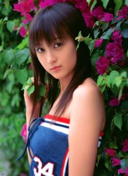  1girl asian blouse breasts brown_hair female_focus flower japanese_(nationality) komatsu_ayaka long_hair looking_at_viewer photo_(medium) ribbon shirt solo 