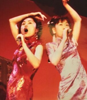  china_dress chinese_clothes dress fukami_rica funky_twins microphone music red_dress sailor_venus shinohara_emi singing voice_actor_connection white_dress  rating:General score:1 user:TokusatsusFan