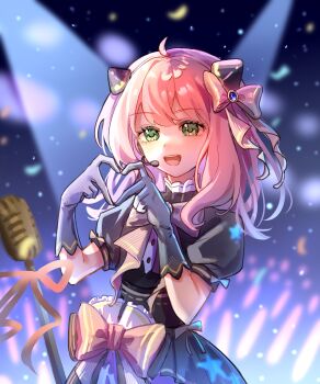  1girl :d absurdres anya_(spy_x_family) black_dress blurry blurry_background bow bowtie chinese_commentary commentary_request confetti dark_background dress four-finger_heart_hands gloves glowstick green_eyes grey_gloves hair_bow hairpods headset heart heart_hands highres huodadada idol light_particles medium_hair microphone_stand open_mouth pink_bow pink_bowtie pink_hair puffy_short_sleeves puffy_sleeves short_sleeves smile solo spotlight spy_x_family teeth tongue upper_body upper_teeth_only 