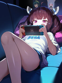  1girl absurdres blue_shorts blush brown_hair commentary_request couch cushion hair_ornament handheld_game_console highres indoors knee_up lying nintendo_switch purple_hair sega shirt short_shorts shorts t-shirt thighs torisan touhoku_kiritan voiceroid white_shirt 