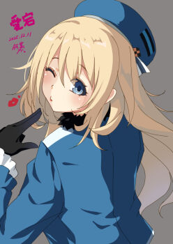  1girl atago_(kancolle) back beret black_gloves blonde_hair blue_jacket blush breasts dated gloves green_eyes grey_background hat jacket kantai_collection kochipu large_breasts long_hair looking_at_viewer looking_back military_uniform one_eye_closed smile solo upper_body 