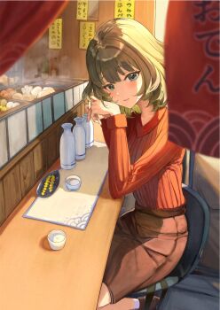  1girl blue_eyes blush bottle brown_skirt choko_(cup) closed_mouth commentary_request cup elbow_rest from_side green_eyes green_hair heterochromia highres idolmaster idolmaster_cinderella_girls long_sleeves looking_at_viewer medium_hair mole mole_under_eye nyome991 own_hands_together pencil_skirt red_sweater sake_bottle sitting skirt smile solo sweater takagaki_kaede 