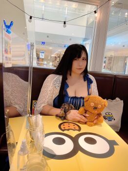  1girl asian black_hair breasts chouzuki_maryou cleavage dress highres lipstick makeup photo_(medium) plump solo stuffed_animal stuffed_toy teddy_bear  rating:Sensitive score:2 user:resident88