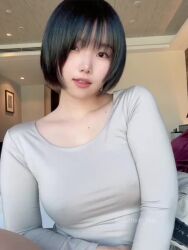 1girl animated black_eyes black_hair breasts clothes_lift covered_erect_nipples indoors medium_breasts photo_(medium) real_life shirt_lift short_hair solo sumire_live teasing underboob video