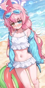 1girl absurdres ahoge beach bikini blue-tinted_eyewear blue_archive blue_jacket blush capry eyewear_on_head frilled_bikini frills hair_bobbles hair_ornament halo heterochromia highres hoshino_(blue_archive) hoshino_(swimsuit)_(blue_archive) huge_ahoge jacket long_hair low_twintails navel ocean official_alternate_costume open_clothes open_jacket pink_halo smile solo sunglasses swim_ring swimsuit tinted_eyewear twintails white-framed_eyewear white_bikini