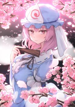 1girl absurdres arm_under_breasts bekkuro black_ribbon blue_hat blue_kimono blush center_frills cherry_blossoms commentary falling_petals folded_fan folding_fan frilled_hat frills hand_fan hat highres hitodama holding holding_fan japanese_clothes kimono looking_at_viewer mob_cap neck_ribbon outdoors petals pink_eyes pink_hair ribbon saigyouji_yuyuko sailor_collar smile solo touhou triangular_headpiece white_sailor_collar