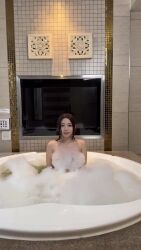 1girl animated asian bath bathing bathroom bathtub black_hair convenient_censoring highres indoors long_hair looking_at_viewer nude parted_lips real_life saotome_kana smile soap_bubbles soap_censor solo sound standing tagme teeth video