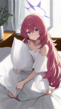 1girl absurdres blue_archive fluffy_hair grey_eyes hair_between_eyes halo highres hugging_object indoors iroha_(blue_archive) long_hair looking_at_viewer nightgown on_bed pillow pillow_hug purple_halo red_hair solo user_505240092 white_nightgown