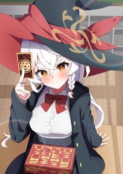 blue_archive book bow bowtie braid card classroom earrings eri_(blue_archive) halo hat highres holding holding_book holding_card jacket jewelry long_coat long_hair orange_eyes ring shirt sitting sitting_on_table skirt sweater white_hair witch_hat