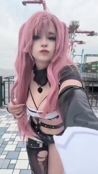 1girl animated audible_music audible_speech black_ribbon black_shorts bouncing_breasts breasts cleavage cosplay dancing english_audio female_focus heart heart_necklace jewelry large_breasts long_hair looking_at_viewer necklace nicole_demara nicole_demara_(cosplay) pink_hair real_life ribbon saltedfishcakes shorts solo sound thick_thighs thighs video zenless_zone_zero