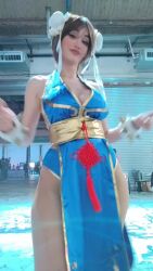 1girl alternate_costume animated argentine_(nationality) ass ass_shake audible_music bare_hips bare_legs bare_shoulders blue_dress blue_eyes bracelet braid breasts brown_hair capcom china_dress chinese_clothes chun-li chun-li_(cosplay) cleavage clenched_hands cosplay curvy dancing double_bun dress fighting_stance fingernails hair_bun high_heels jewelry large_breasts legs leotard leotard_under_clothes lips lipstick long_hair looking_at_viewer makeup medium_breasts no_bra pelvic_curtain photo_(medium) real_life revealing_clothes shiny_clothes short_dress simple_background smile sophie_valentine sound source_request spiked_bracelet spikes standing street_fighter street_fighter_iv_(series) tagme thick_thighs thighs video wide_hips