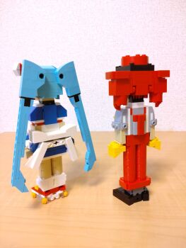 Rule 34 | 2girls, alternate costume, back bow, black footwear, blue dress, blue hair, bow, choroli (chorolin), dress, drill hair, from behind, full body, gloves, grey shirt, hat, hatsune miku, highres, kasane teto, lego (medium), long hair, mesmerizer (vocaloid), multiple girls, pants, puffy short sleeves, puffy sleeves, red footwear, red hair, red hat, red pants, roller skates, shirt, shoes, short dress, short sleeves, skates, sleeves rolled up, socks, standing, suspenders, twin drills, twintails, unconventional media, very long hair, vocaloid, white socks, yellow gloves