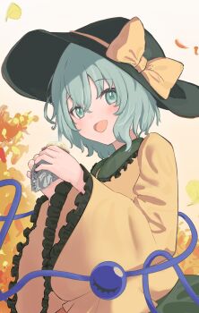 1girl baked_potato black_hat blush bow green_eyes green_hair hat hat_bow highres komeiji_koishi long_sleeves looking_at_viewer open_mouth short_hair solo tentyuu_th third_eye touhou upper_body wide_sleeves yellow_bow