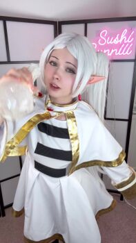 Rule 34 | 1girl, animated, ass, ass shake, bra, breasts, completely nude, cosplay, cosplay photo, elf, fellatio gesture, female focus, frieren, frieren (cosplay), mage staff, navel, nipples, nude, panties, photo (medium), pointy ears, potion, pussy, real life, robe, sleeping, solo, sound, sousou no frieren, staff, sushibunniii, tagme, thighhighs, twintails, underwear, video, white hair, white robe