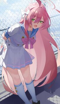 1girl ahoge arms_behind_back bent_over blue_archive blue_sailor_collar blush bow breasts buttons chinese_commentary commentary_request green_eyes hair_between_eyes hair_bow halo hanako_(blue_archive) highres holster kneehighs large_breasts long_hair looking_at_viewer neckerchief open_mouth outdoors pink_hair pink_halo pink_neckerchief pleated_skirt rooftop sailor_collar school_uniform serafuku shirt sidelocks skirt smile socks solo very_long_hair white_bow white_shirt white_socks zhileng_zhil