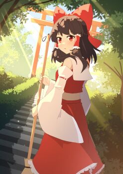 1girl absurdres bow broom brown_hair chinese_commentary commentary_request day detached_sleeves frilled_hair_tubes frilled_skirt frills hair_bow hair_tubes hakurei_reimu highres holding holding_broom long_hair looking_at_viewer open_mouth outdoors red_bow red_eyes red_skirt ribbon-trimmed_sleeves ribbon_trim sdftehn skirt skirt_set solo stairs torii touhou tree