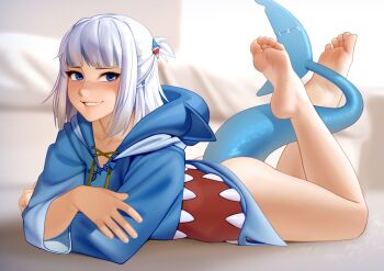 1girl absurdres animal_hood barefoot blue_eyes blue_hoodie blunt_bangs blurry blurry_background commentary feet feet_up fins fish_tail full_body gawr_gura grin highres hololive hololive_english hood hood_down hoodie kairunoburogu legs loli long_sleeves looking_at_viewer lying no_pants on_stomach shark_tail sharp_teeth silver_hair smile soles solo tail teeth the_pose thighs toes virtual_youtuber white_hair