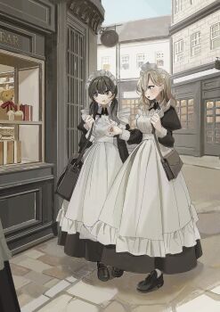 2girls apron bag black_dress black_eyes black_hair black_shoes blonde_hair blue_eyes building commentary_request day dress frilled_apron frills handbag highres juliet_sleeves loafers long_sleeves low_twintails maid maid_apron maid_headdress multiple_girls original outdoors pointing puffy_sleeves shii_(kairi-t-k0317) shoes shoulder_bag storefront stuffed_animal stuffed_toy teddy_bear twintails victorian_maid white_apron