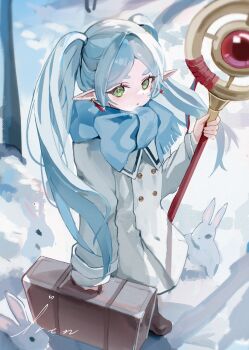 1girl animal blue_scarf boots breath brown_boots coat commentary_request day earrings elf frieren fringe_trim glint green_eyes grey_hair highres holding holding_staff iren_lovel jewelry long_hair long_sleeves orb outdoors parted_bangs parted_lips pointy_ears rabbit scarf short_eyebrows snow solo sousou_no_frieren staff suitcase thick_eyebrows twintails very_long_hair white_coat