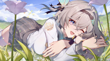 1girl ;d absurdres black_hairband blue_eyes blue_sky brown_hair chinese_commentary cloud commentary_request day firefly_(honkai:_star_rail) firefly_(spring_missive)_(honkai:_star_rail) flower grass grey_hair grey_skirt hair_between_eyes hairband hanayabaka highres honkai:_star_rail honkai_(series) long_hair long_sleeves looking_at_viewer lying meadow multicolored_eyes on_stomach one_eye_closed open_mouth outdoors pink_eyes plaid_clothes plaid_skirt school_uniform shirt skirt sky smile solo thighhighs white_shirt white_thighhighs