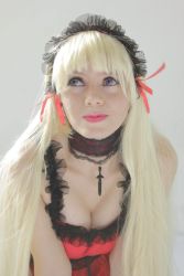 1girl blonde_hair breasts cleavage cleavage_cutout clothing_cutout cosplay cosplay_photo dress goth_fashion goth_fashion gothic_lolita grey_eyes highres jewelry latin lips lolita_fashion medium_breasts necklace pale_skin photo_(medium) red_dress