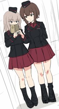 Rule 34 | 2girls, ankle boots, ankle socks, arms behind back, ashiwara yuu, black jacket, black socks, blue eyes, boots, breasts, brown eyes, brown hair, cellphone, commentary request, cross, full body, garrison cap, girls und panzer, grey hair, hat, highres, holding, holding phone, iron cross, itsumi erika, jacket, kuromorimine military uniform, large breasts, long hair, long sleeves, looking at another, miniskirt, multiple girls, nishizumi maho, phone, pleated skirt, red shirt, red skirt, shirt, short hair, skirt, smartphone, smile, socks