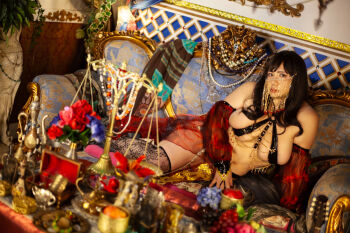 1girl asian belly belly_dancer black_hair breasts chouzuki_maryou cleavage highres large_breasts lipstick makeup photo_(medium) plump solo thick_thighs thighs underboob