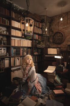 1girl absurdres alice_margatroid blonde_hair book book_stack bookshelf brick_wall clock cosplay cosplay_photo highres indoors jar medium_hair photo_(medium) picture_frame raira_rairan roman_numeral solo touhou wall_clock