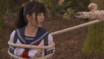 1girl animated animated_gif breasts claws lowres monster nipples outdoors parasite photo_(medium) restrained school_uniform serafuku tentacles torn_clothes