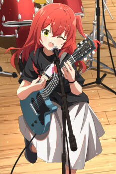 1girl :d absurdres black_shirt black_shoes blush bocchi_the_rock! breasts cable chinosuke_(cs4126) commentary_request double-parted_bangs drum electric_guitar gibson_les_paul green_eyes grey_skirt guitar guitar_strap highres holding holding_guitar holding_instrument holding_plectrum instrument kita_ikuyo leg_up long_skirt looking_at_viewer medium_hair microphone microphone_stand music one_eye_closed one_side_up open_mouth playing_instrument plectrum red_hair shirt shoes skirt small_breasts smile solo standing wooden_floor wristband