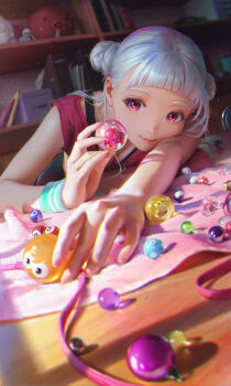 1girl arashi_chisato blunt_bangs breasts capsule chair cleavage double_bun gashapon hair_behind_ear hair_bun highres love_live! love_live!_superstar!! marble_(toy) namako_mikan pink_shirt red_eyes shelf shirt short_bangs sitting smile sweatband table toy white_hair wooden_table