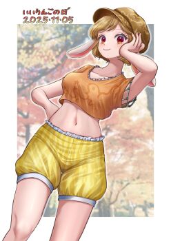 1girl animal_ears blonde_hair breasts brown_hat closed_mouth collarbone commentary_request crop_top dated flat_cap floppy_ears hat highres kyabekko looking_at_viewer midriff navel orange_shirt rabbit_ears red_eyes ringo_(touhou) shirt short_hair short_sleeves shorts smile solo touhou translation_request yellow_shorts