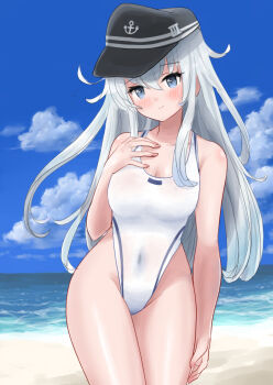 1girl alternate_breast_size_(larger) beach blue_eyes blue_sky blush breasts cloud cloudy_sky commentary_request competition_swimsuit cowboy_shot day flat_cap grey_hair hair_between_eyes hand_on_own_chest hat hibiki_(kancolle) kantai_collection kitagawa_mikio long_hair looking_at_viewer medium_breasts ocean one-piece_swimsuit sand sky smile solo swimsuit water white_hair white_one-piece_swimsuit