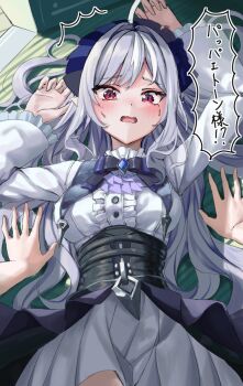 1girl 1other ^^^ ahoge arms_up ascot blue_gem blush bow bowtie breasts center_frills commentary_request drill_hair frilled_sleeves frills gem hairband long_hair looking_at_viewer lying medium_breasts mole mole_under_eye on_back open_mouth pointy_ears pov pov_hands purple_ascot purple_bow purple_bowtie purple_hair purple_hairband red_eyes shrug_(clothing) speech_bubble sweat translation_request vivian_banshee white_shrug yuge_(setsura) zenless_zone_zero