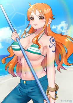 1girl 2025 absurdres bangle bare_shoulders bikini bikini_top_only blue_pants blue_sky blush bracelet breasts brown_eyes cleavage clima-tact closed_mouth cloud cloudy_sky collarbone commentary_request cowboy_shot denim earrings green_bikini halterneck highres holding holding_staff horizon jeans jewelry large_breasts linea_alba lips log_pose long_hair looking_at_viewer nami_(one_piece) nami_(one_piece)_(return_to_sabaody) navel obakeneko ocean official_alternate_costume one_piece orange_hair outdoors pants pearl_earrings pink_lips sandals shoulder_tattoo sky solo staff stomach string_bikini sunlight swimsuit tattoo water wavy_hair