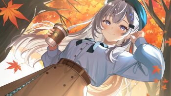 1girl alternate_costume autumn autumn_leaves beret brown_skirt commentary cup disposable_coffee_cup disposable_cup earrings grey_eyes grey_hair hat highres hololive hololive_indonesia jewelry leaf long_hair rupinn_art single_earring skirt smile symbol-only_commentary tree vestia_zeta virtual_youtuber