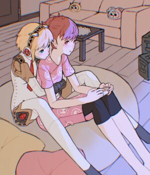 2girls aigis_(persona) android aqua_eyes arms_around_waist bean_bag_chair black_leggings blonde_hair blunt_bangs blush chromatic_aberration closed_mouth coffee_table collarbone controller couch dress feet_out_of_frame gold_hairband hairband highres holding holding_controller hug indoors joints knees_up leggings looking_ahead looking_at_another mechanical_arms mechanical_legs multiple_girls necktie parted_lips persona persona_3 persona_3_portable pillow pink_dress print_dress red_hair red_necktie robot_ears robot_joints shiomi_kotone short_hair sitting table tbjj1208 yuri