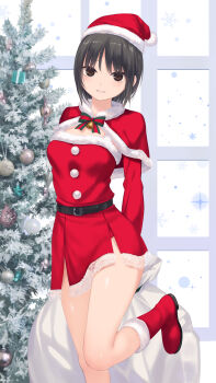 1girl black_hair boots breasts brown_eyes capelet christmas_tree coffee-kizoku commentary_request dress fur-trimmed_boots fur-trimmed_capelet fur-trimmed_dress fur-trimmed_headwear fur_trim hat highres looking_at_viewer original sack santa_costume santa_hat short_hair small_breasts solo