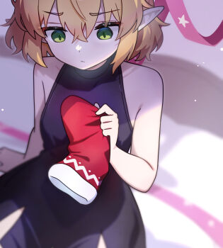 1girl alternate_costume black_dress blonde_hair blurry chikuzen1996 christmas closed_mouth commentary_request depth_of_field dress green_eyes highres holding_sock mizuhashi_parsee pointy_ears sitting socks solo touhou unworn_socks