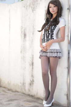 1girl absurdres asian asiangirl5832 brown_hair female_focus headband high_heels highres long_hair looking_at_viewer model outdoors pantyhose photo_(medium) shirt skirt solo white_shirt