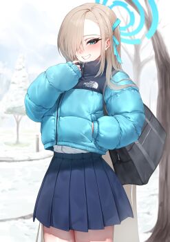 1girl absurdres asuna_(blue_archive) bag bare_tree black_bag blonde_hair blue_archive blue_eyes blue_halo blue_jacket blue_ribbon blue_skirt blush commentary down_jacket grin hair_over_one_eye hair_ribbon halo hand_in_pocket hashtag-only_commentary highres jacket long_hair long_sleeves looking_at_viewer mikelee0614 outdoors pleated_skirt product_placement ribbon school_bag shirt simple_background skirt smile snow solo tree white_background white_shirt winter zipper zipper_pull_tab