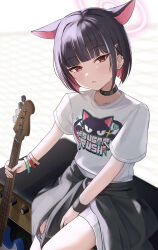 1girl absurdres animal_ears bass_guitar black_choker black_hair black_jacket blue_archive cat_ears cat_girl choker clothes_around_waist colored_inner_hair cowboy_shot earclip extra_ears hair_ornament hairclip halo highres holding holding_bass_guitar holding_instrument instrument jacket jacket_around_waist kazusa_(band)_(blue_archive) kazusa_(blue_archive) looking_at_viewer miniskirt multicolored_hair parted_lips pink_hair pink_halo pleated_skirt red_eyes shirt short_hair sitting skirt solo t-shirt wasi white_background white_shirt white_skirt